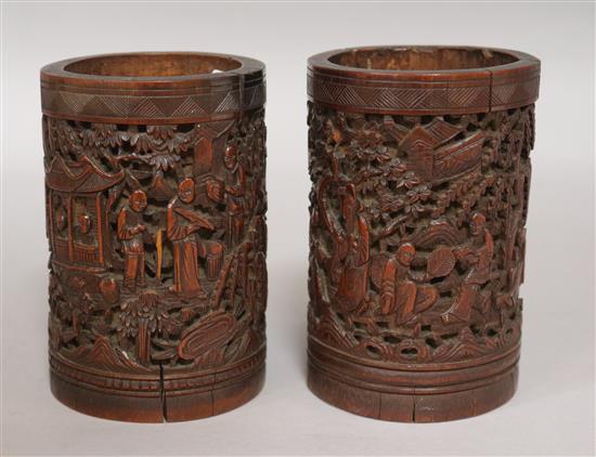 2 similar Chinese bamboo brush pots carved in relief of figures 19th Century